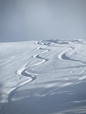 white sand under blue sky during daytime