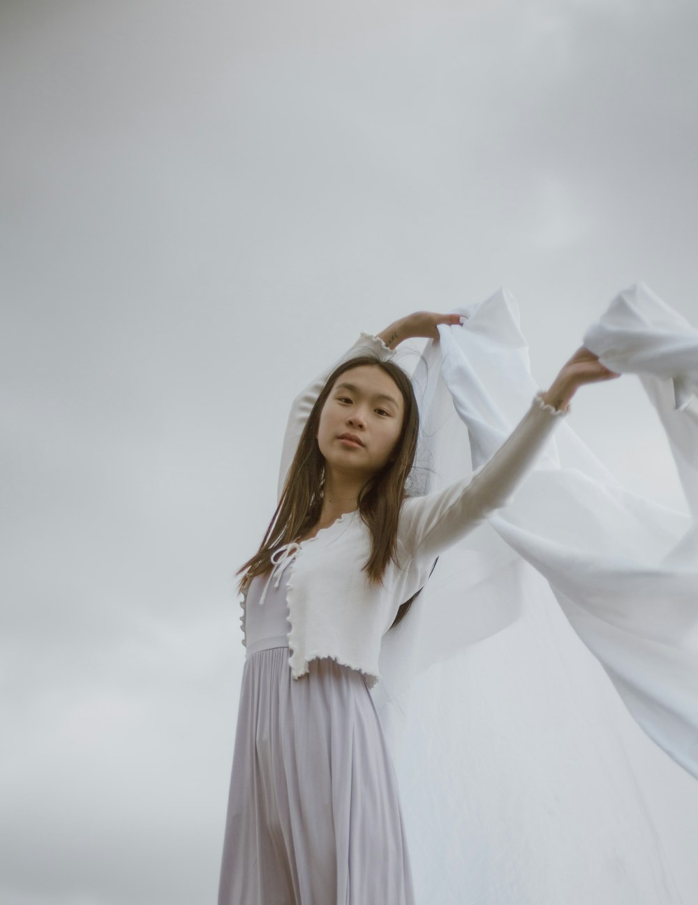 woman in white long sleeve dress