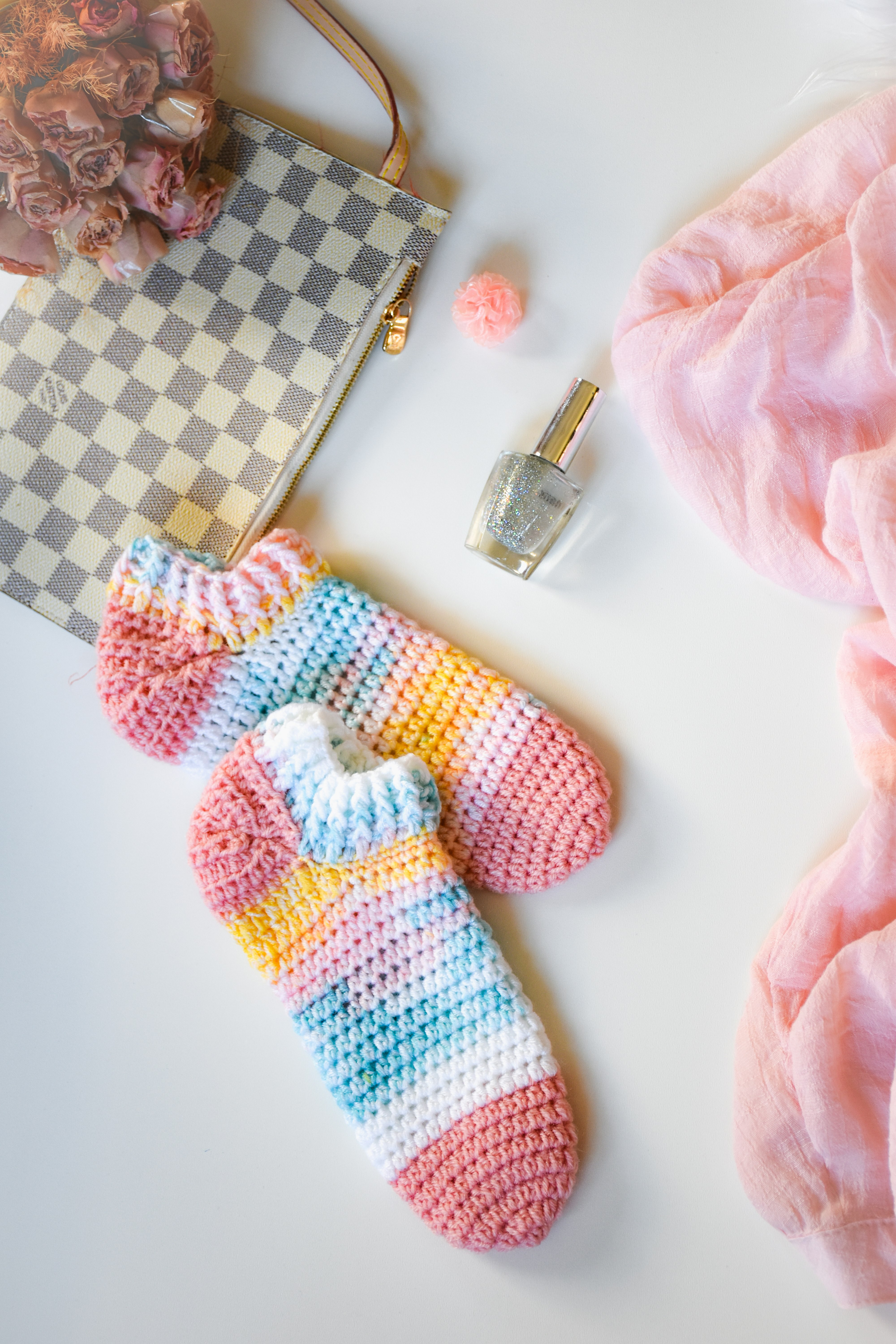 pink and white knit sock