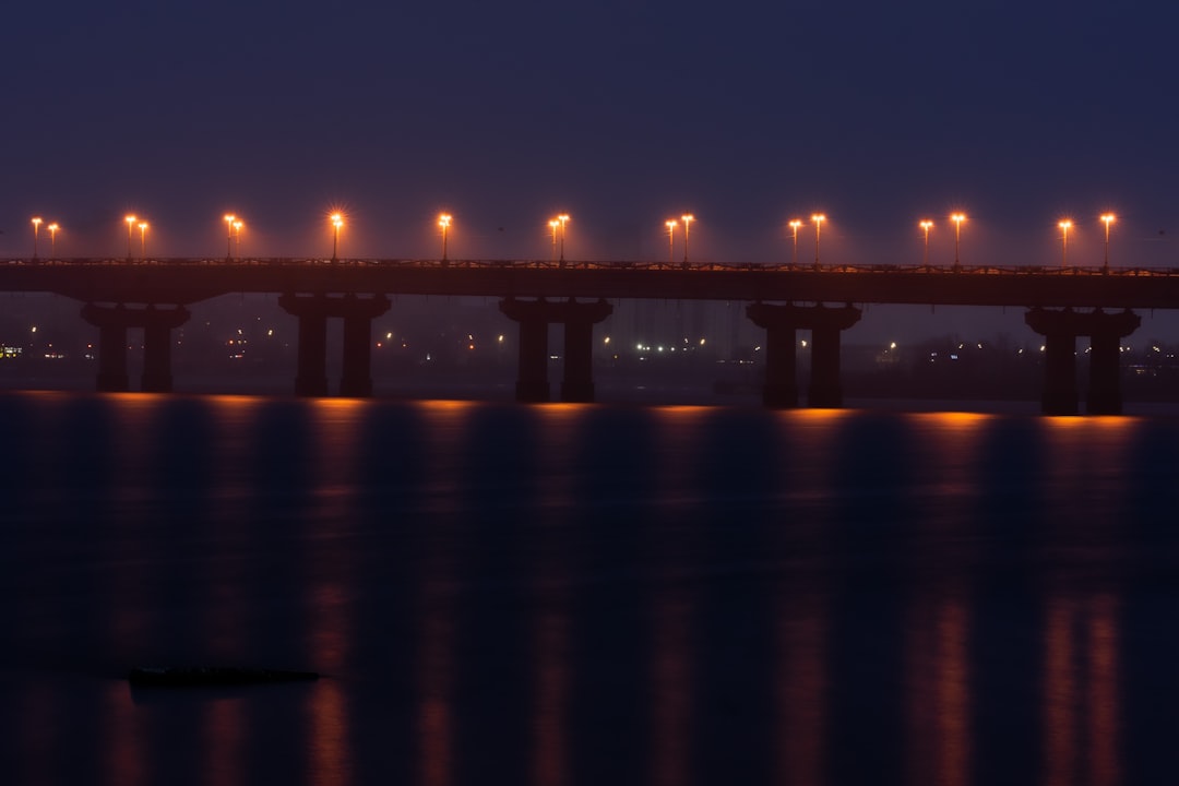 bridge over the water during night time