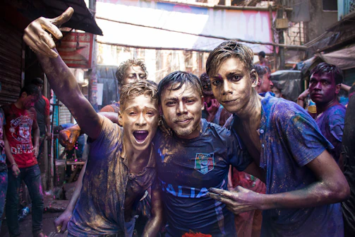 A group of friends celebrating at a vibrant festival abroad.