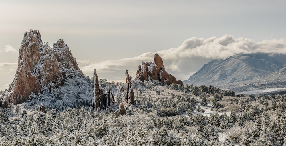 brown and white rocky mountain under white sky during daytime