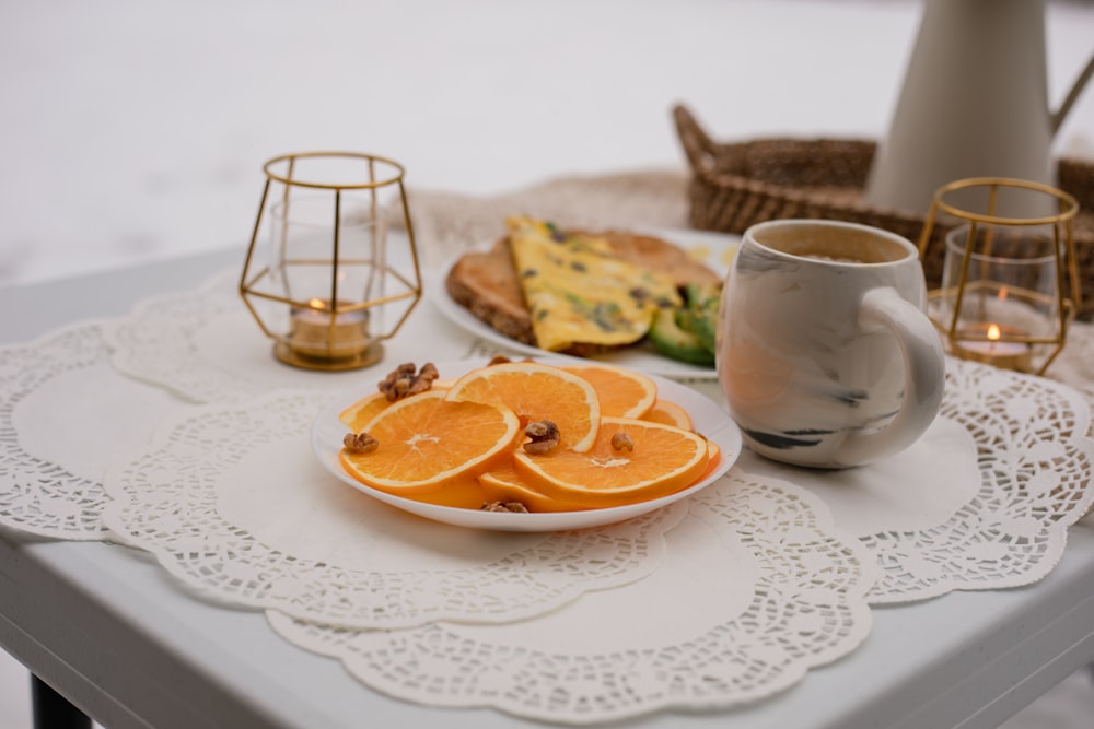 sliced orange fruit on white ceramic plate