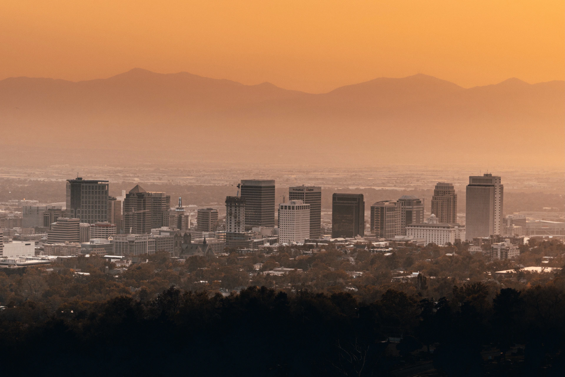 city skyline under blue sky during daytime