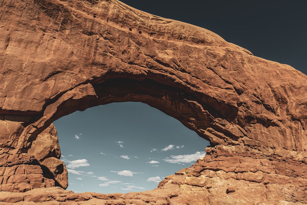 brown rock formation under blue sky during daytime