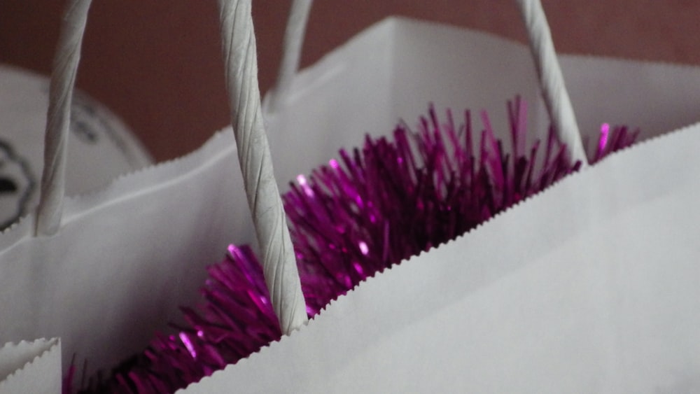 purple and white woven basket