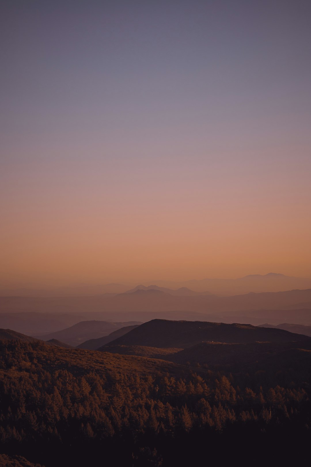 brown mountains under white sky during daytime