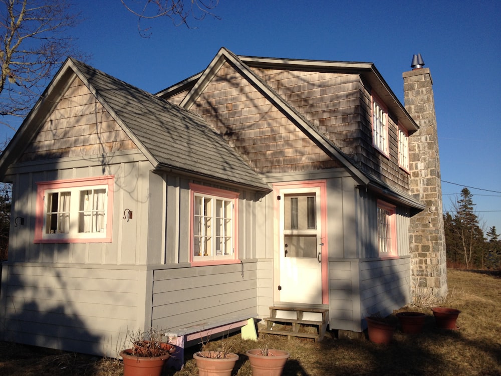 white and gray wooden house