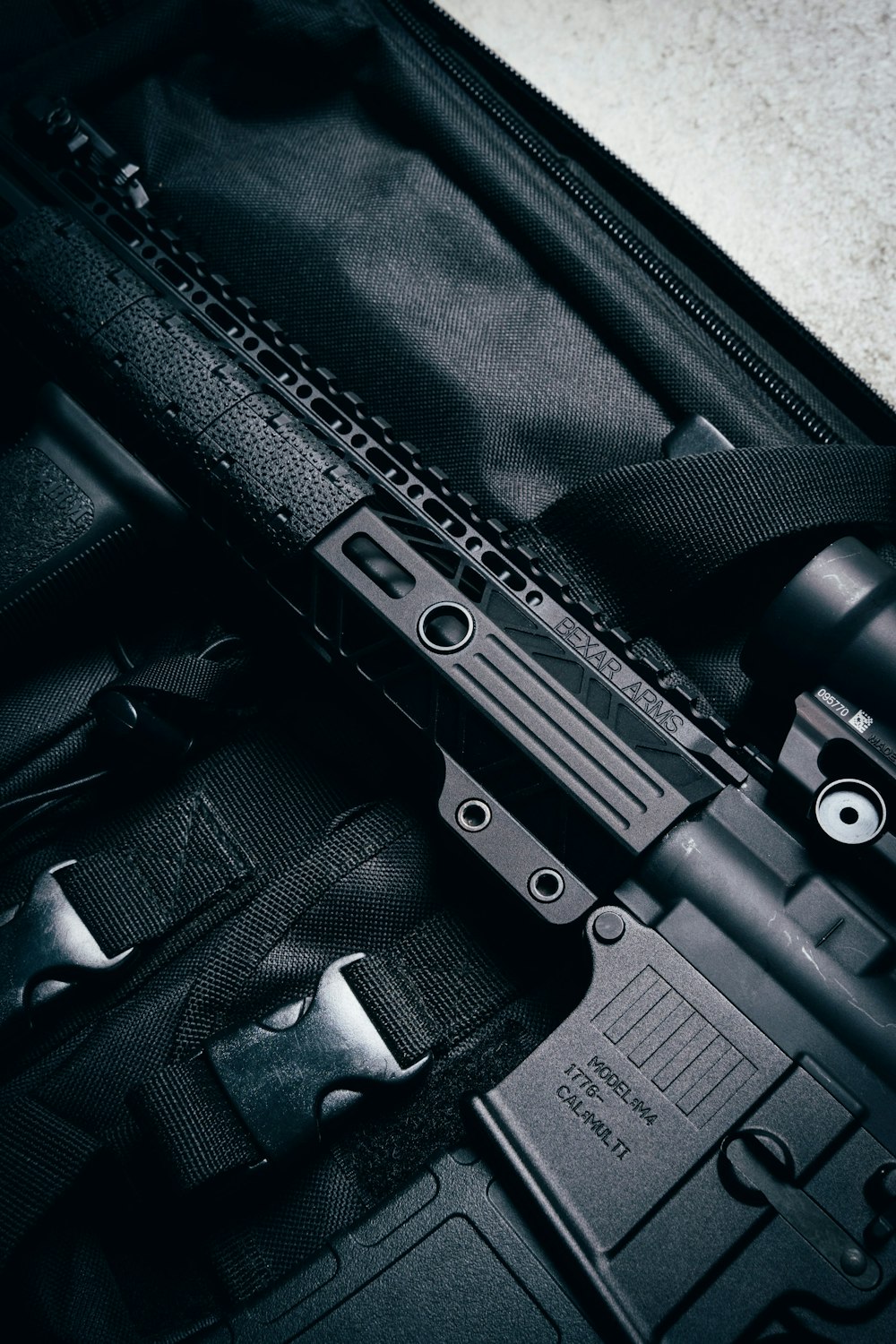 black semi automatic pistol on black case