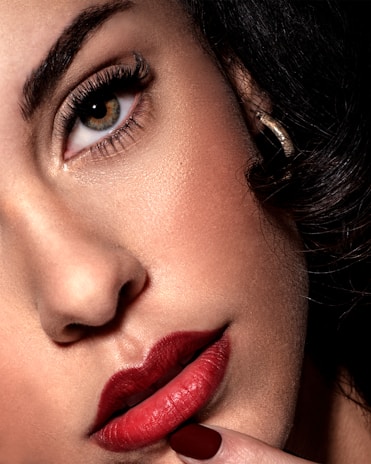 Close-up of a portrait with fly hair removed and blemishes smoothed out.