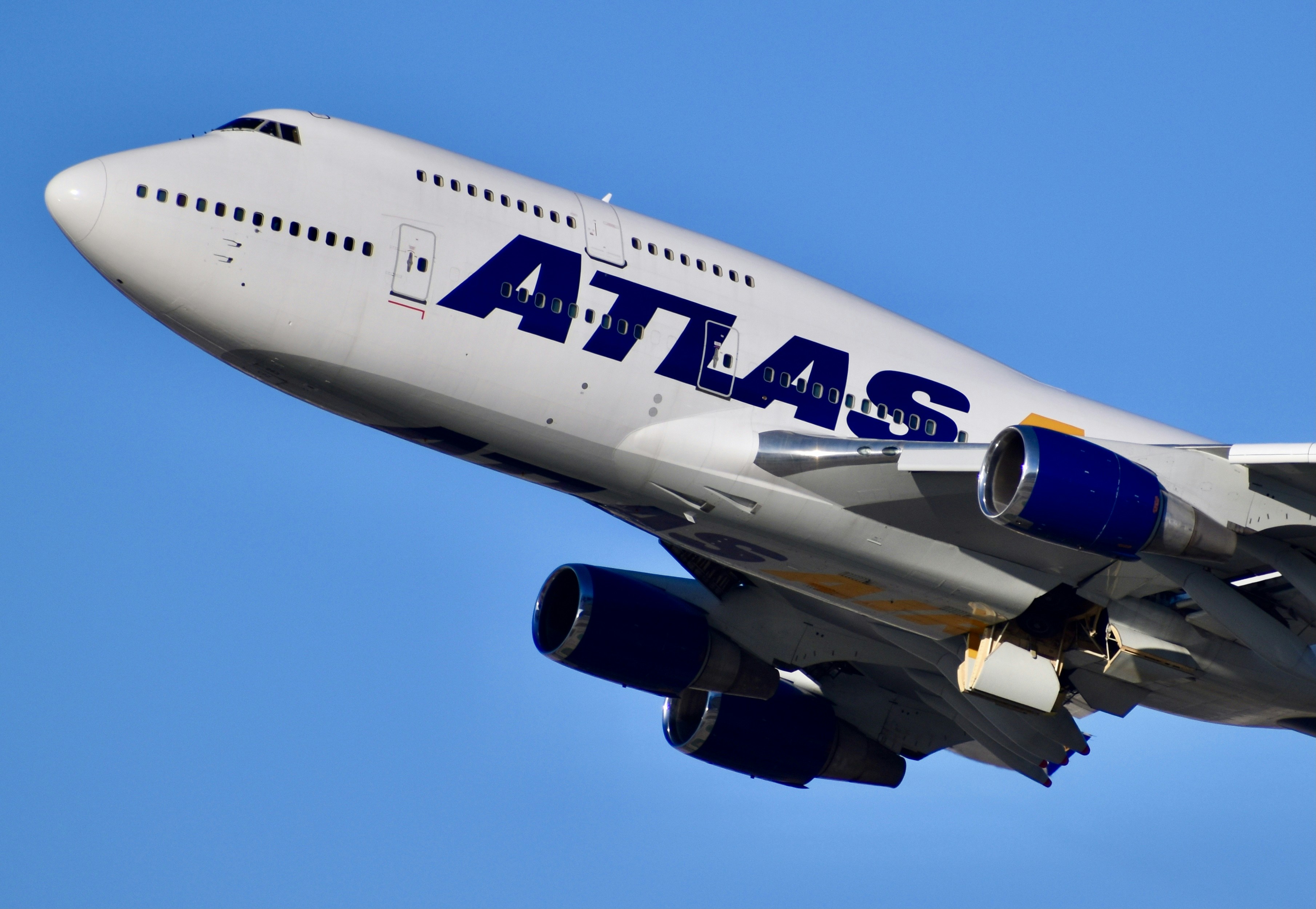 An Atlas Air 747-400ER carrying the Chargers takes off from LAX's 25R.