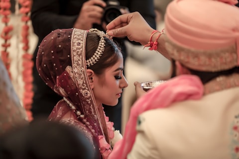an India bride in pink and gold hijab