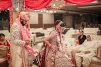 woman in white and red floral dress wearing sunglasses