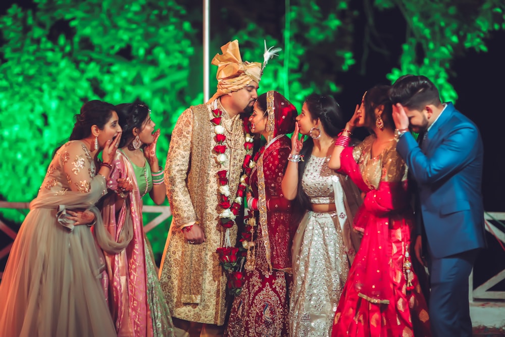 women in red and brown traditional dress