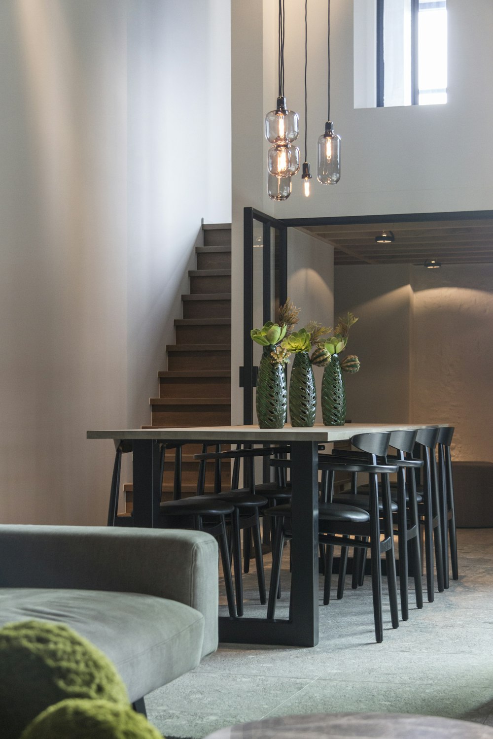 black wooden dining table and chairs