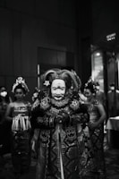 grayscale photo of person wearing mask
