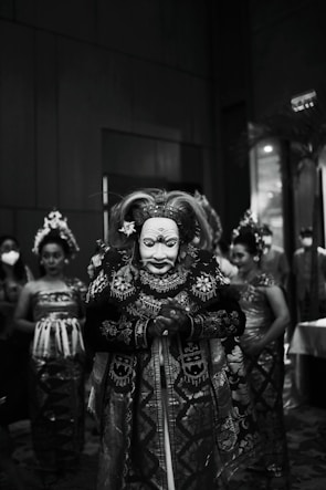 grayscale photo of person wearing mask