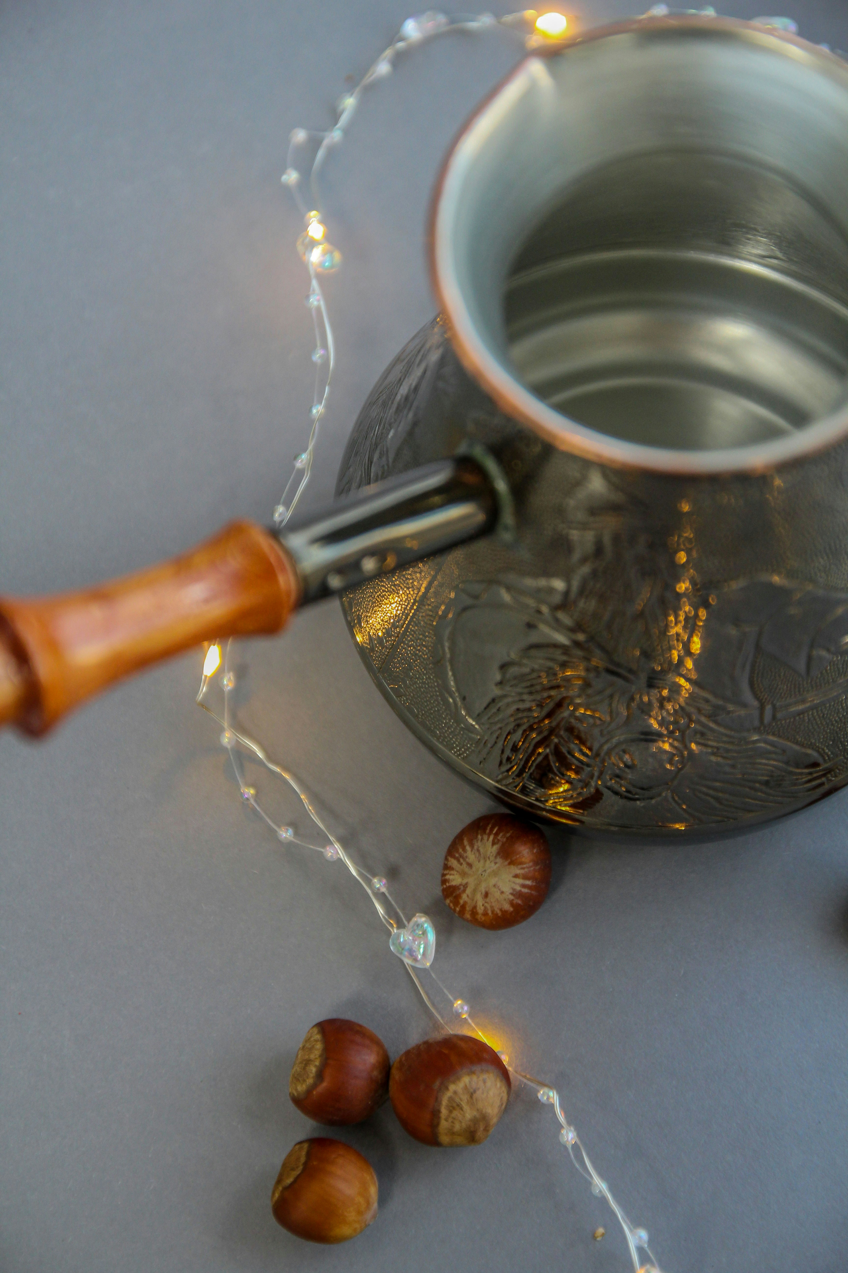 brown wooden handle gray ceramic mug