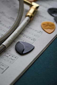 heart shaped yellow ornament on white printer paper