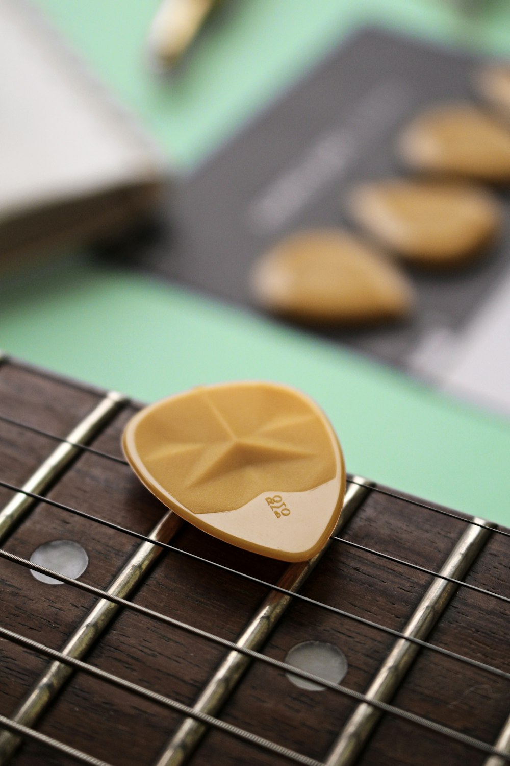 yellow heart shaped guitar pick