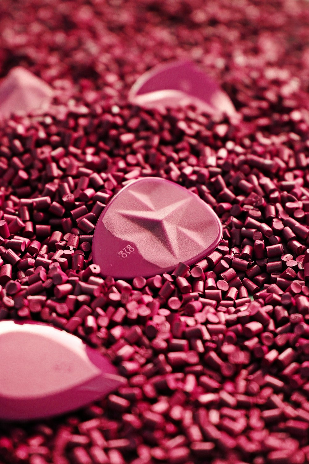 white and black heart on pink and white flower petals