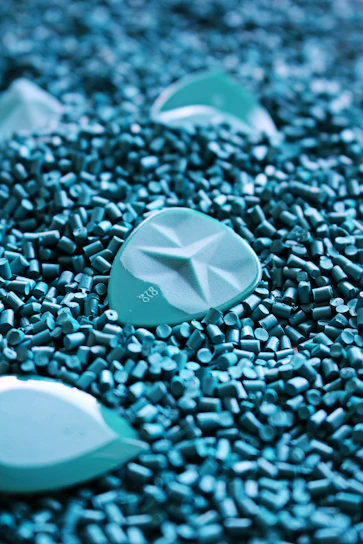 A close-up of recycled plastic pellets ready for processing at Suds facility.