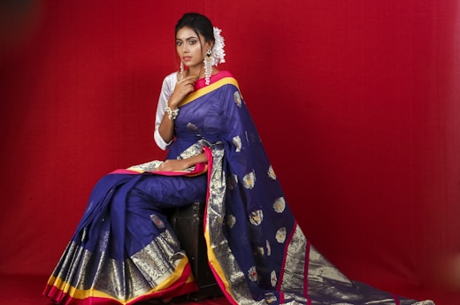 Woman in a blue and yellow sari dress