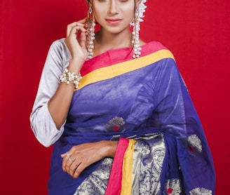 woman in blue and yellow sari dress