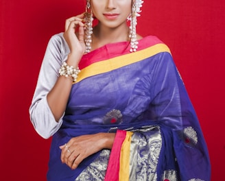 woman in blue and yellow sari dress