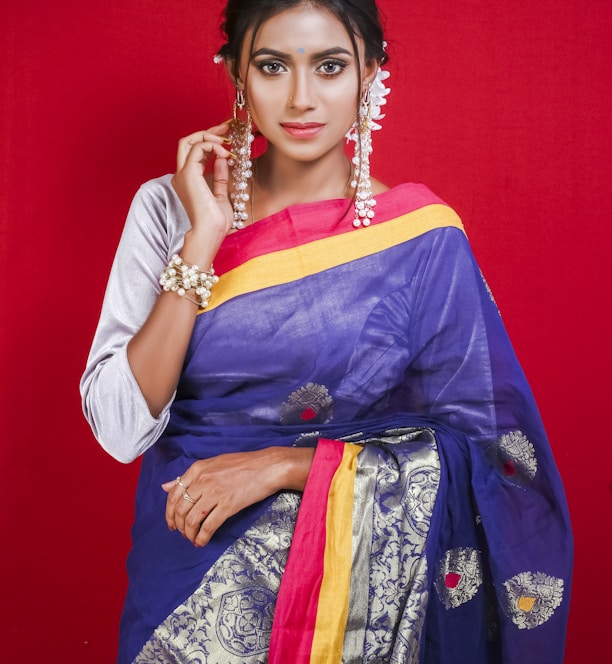 woman in blue and yellow sari dress