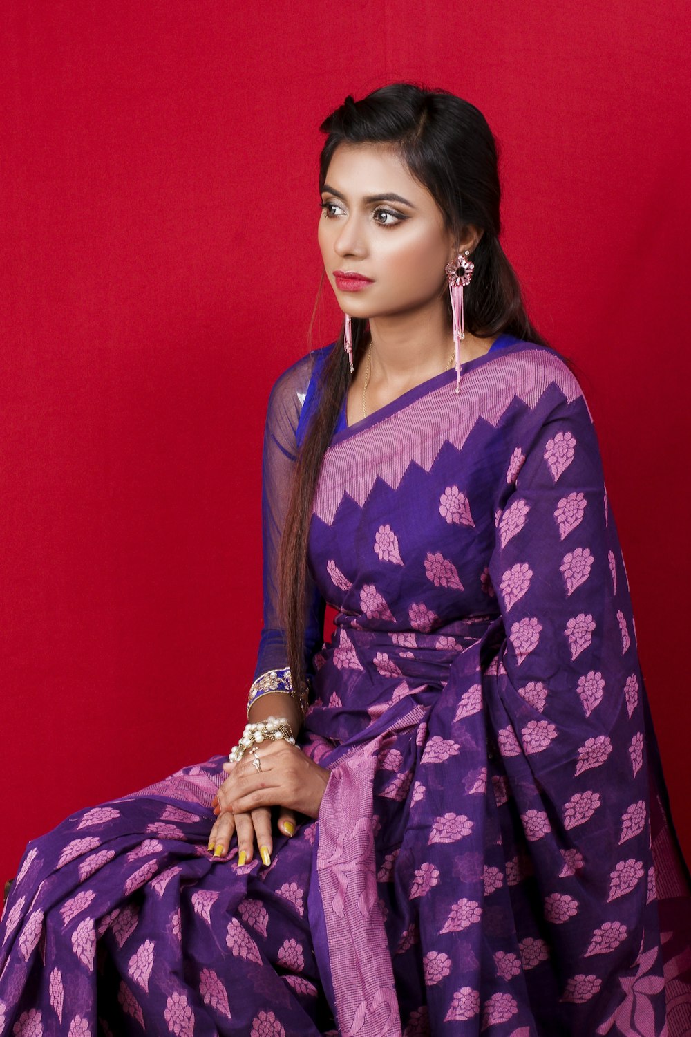 woman in blue and white floral robe