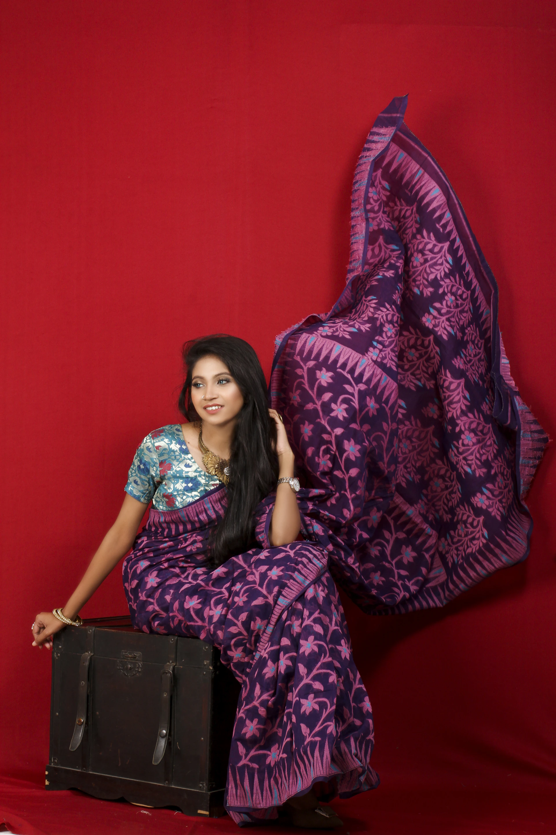 A vibrant banner showcasing a stylish woman wearing trendy fashion pieces from Vistara, set against a soft pastel background.