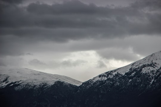 snow covered mountain under cloudy sky during daytime in Mali i Thatë Albania