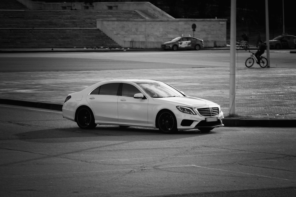 grayscale photo of white bmw m 3 coupe