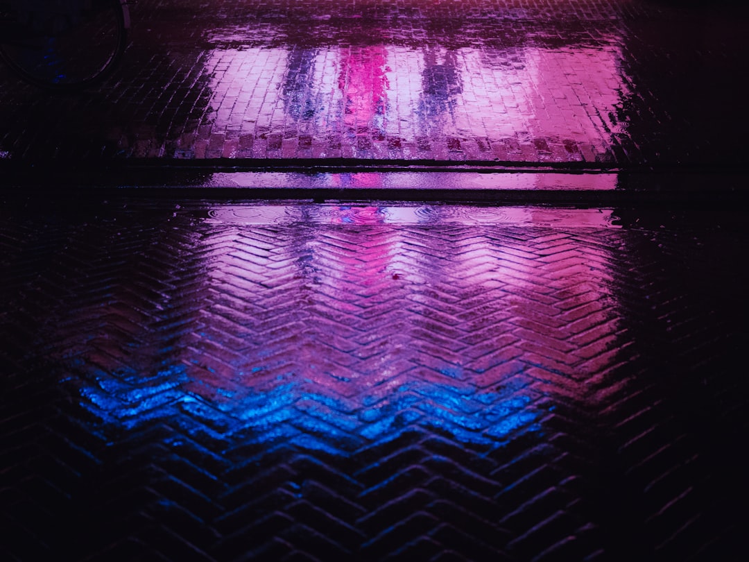 blue and red light reflection, A colorful but rainy night in Haarlem. Tested some new editing technique with neon colors