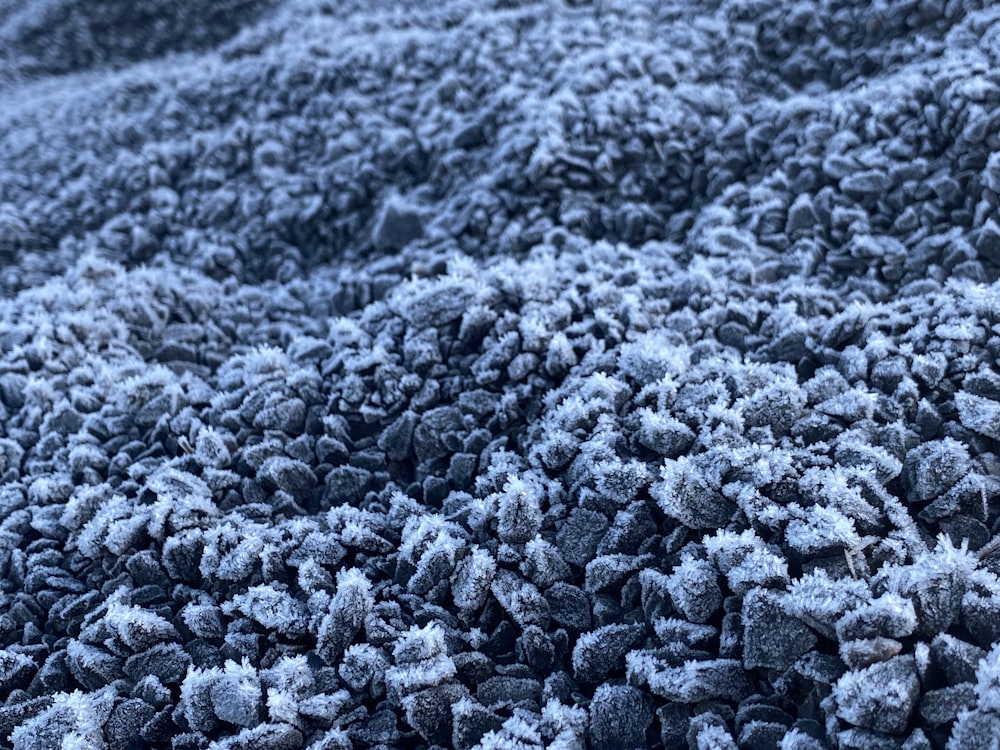 gray stones on gray sand during daytime