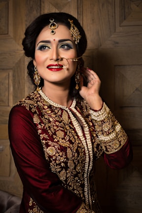 Women’s festive wear featuring rich fabrics and intricate embroidery.