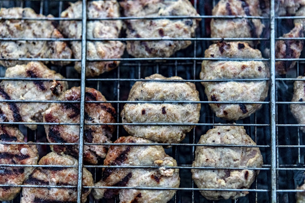 brown and white food on black metal cage