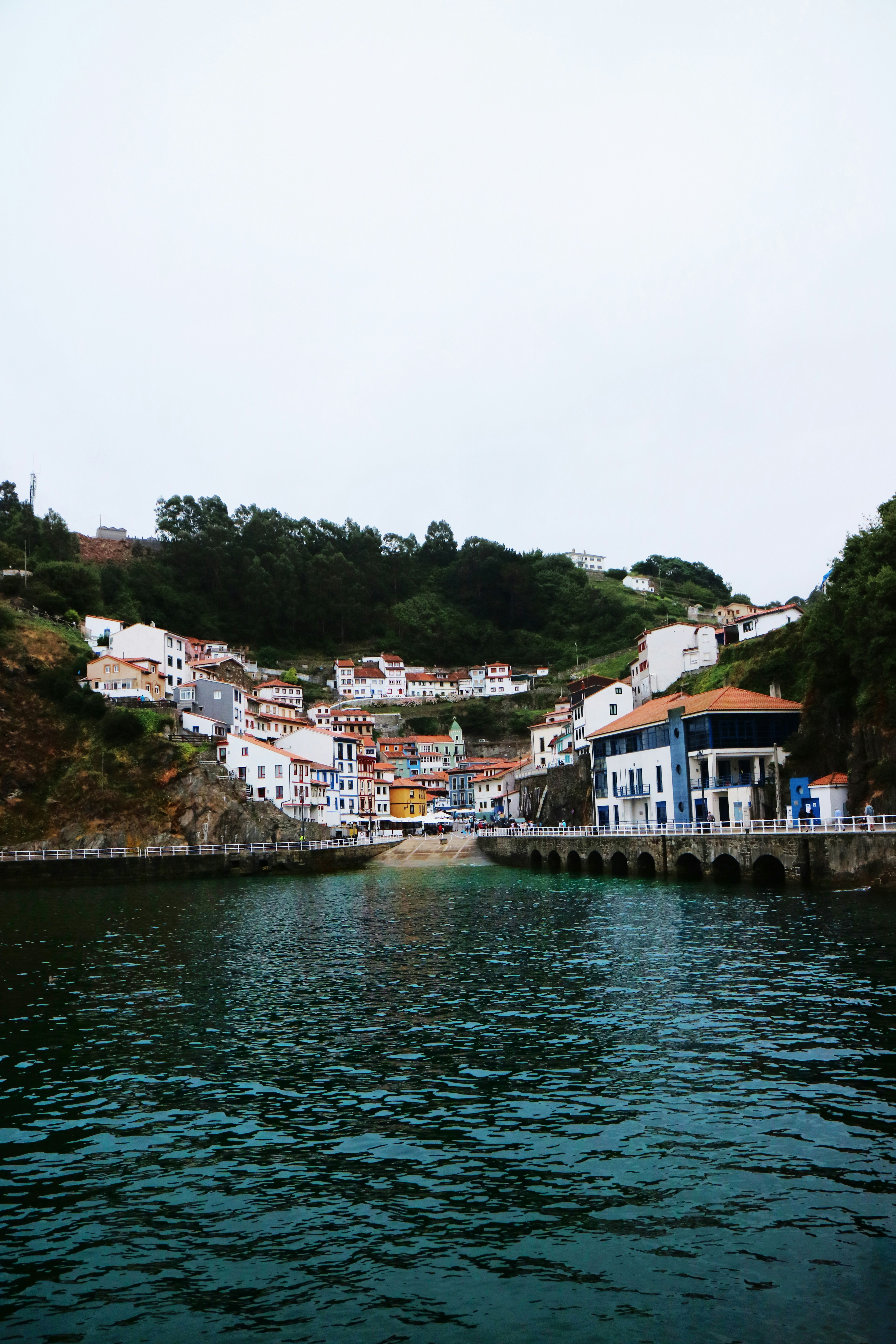 houses near river during daytime