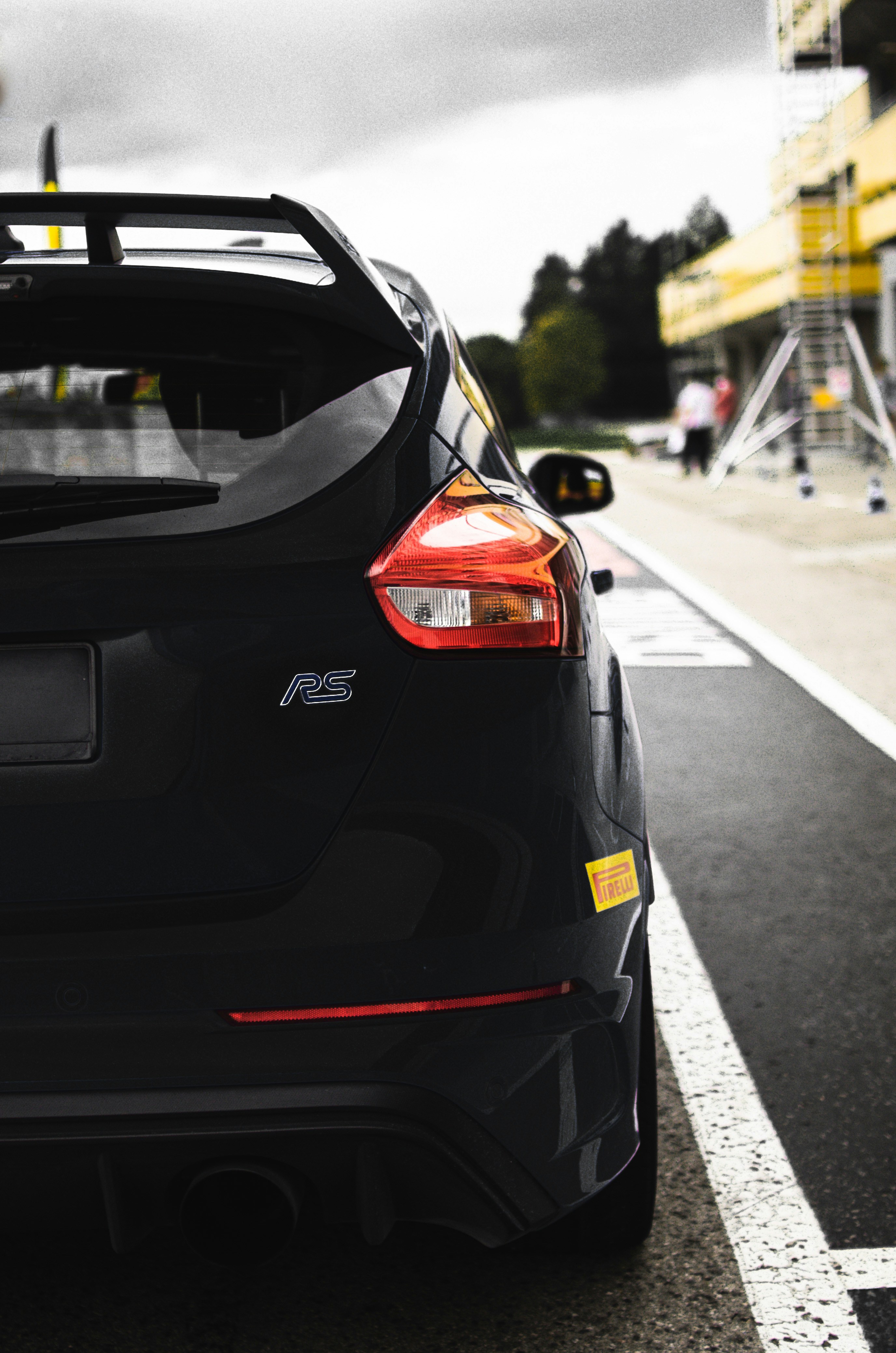 black car on road during daytime