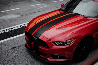 red ferrari 458 italia on road during daytime