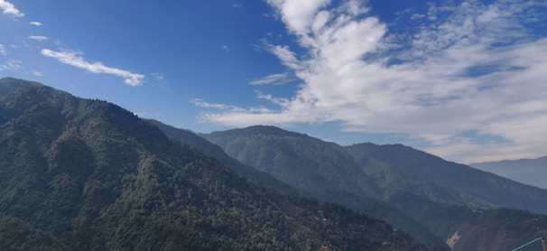 A scenic mountain landscape in South America with lush greenery and clear skies.