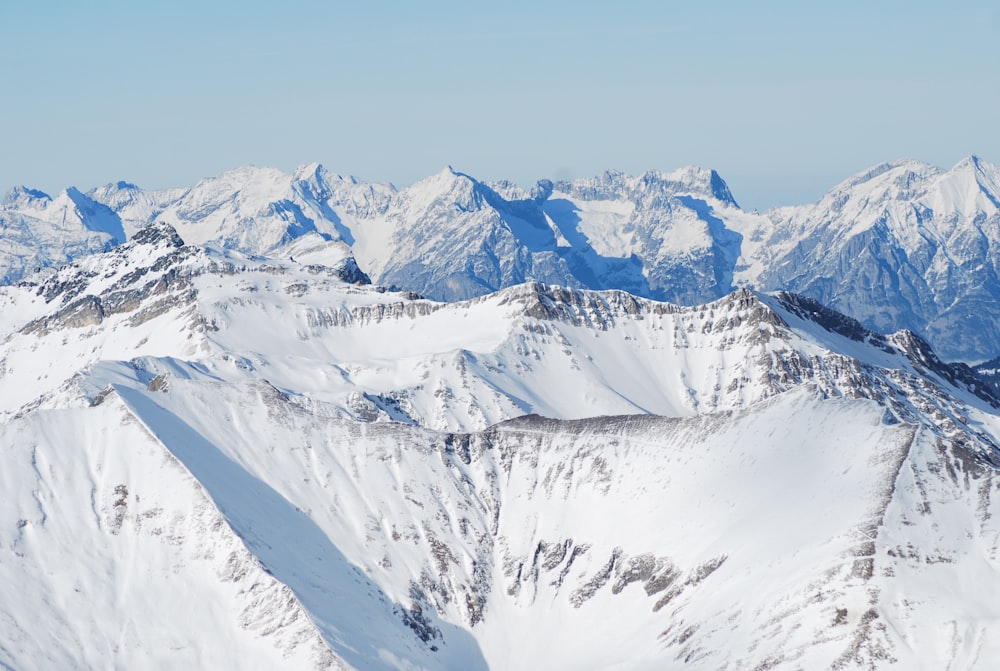 snow covered mountain under blue sky during daytime