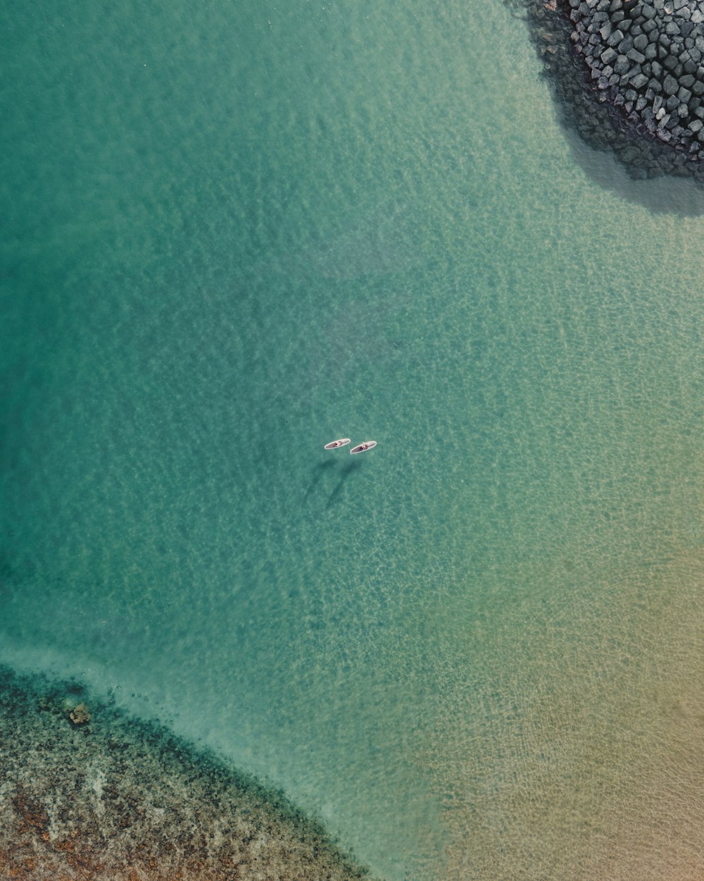 aerial view of boat on sea during daytime