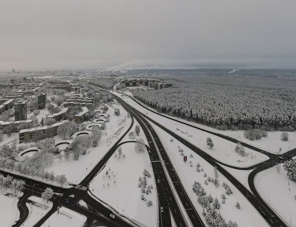snow covered road during daytime