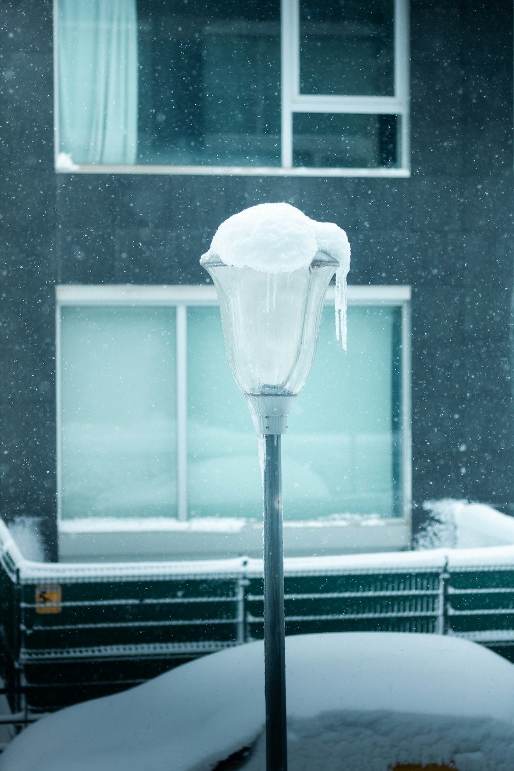 white ice on glass window