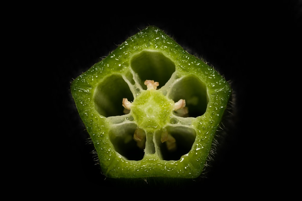 green fruit with water droplets