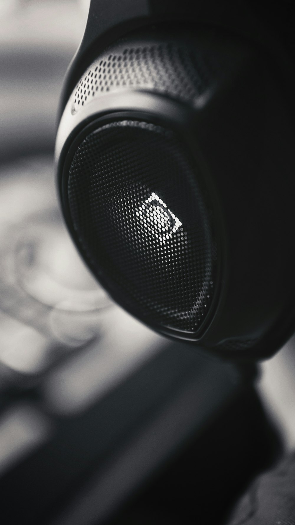 black and silver speaker in grayscale photography