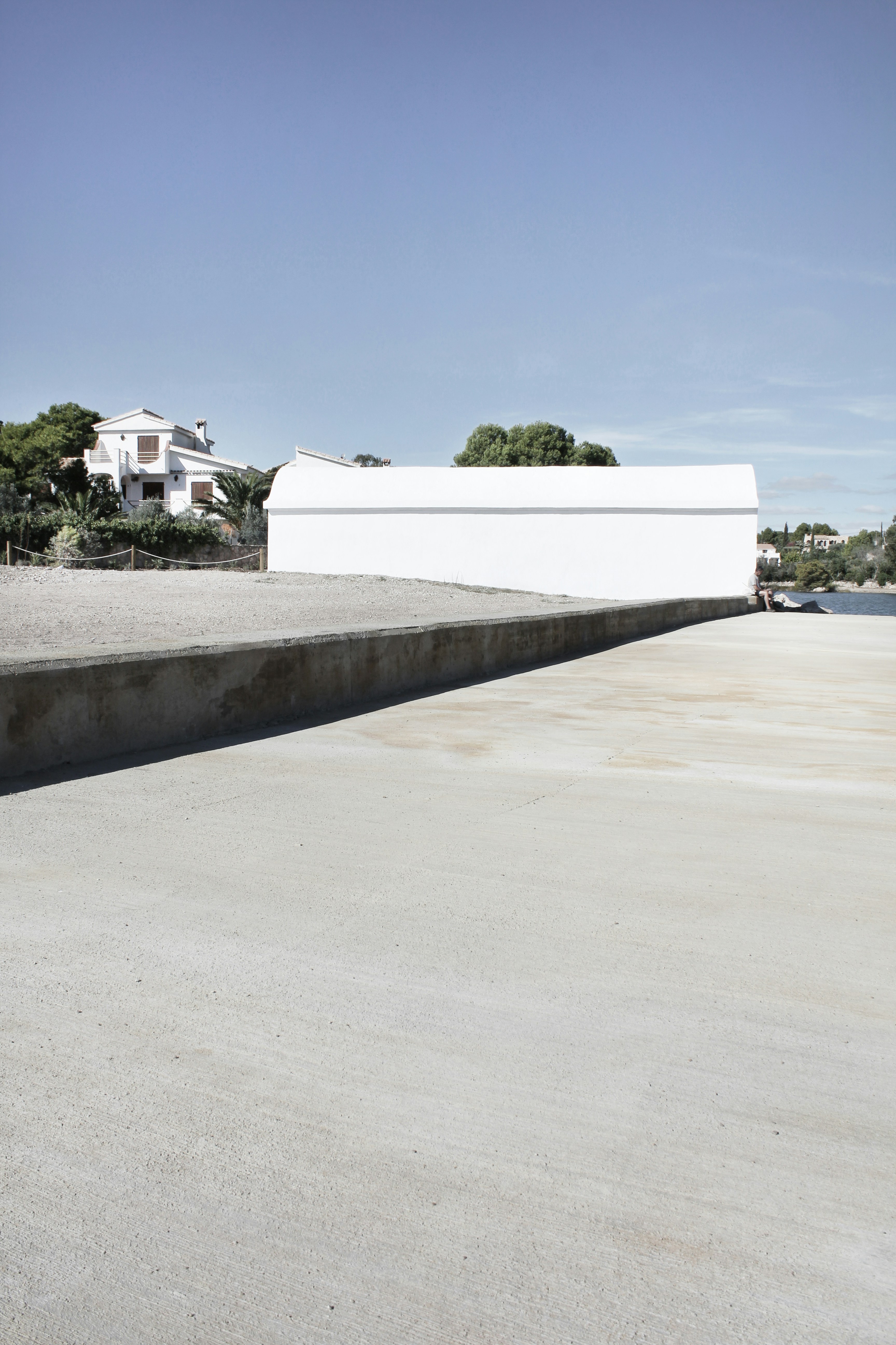 White concrete building near green trees during daytime photo – Free L ...
