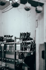 Close-up of skates and performance gear laid out neatly on a bench before training.